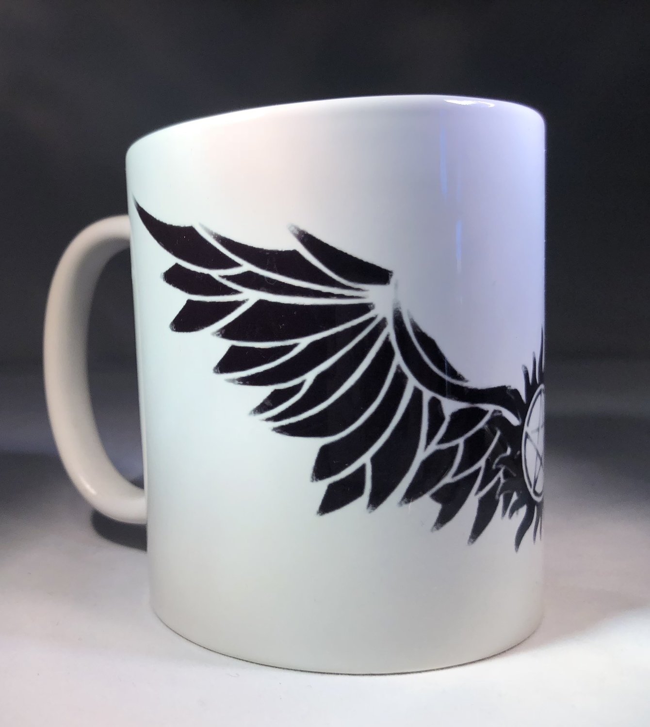 Wings and Antipossession Tattoo Mug