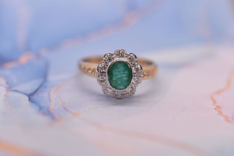 18ct Gold Oval Cut Emerald & Diamond Cluster Ring