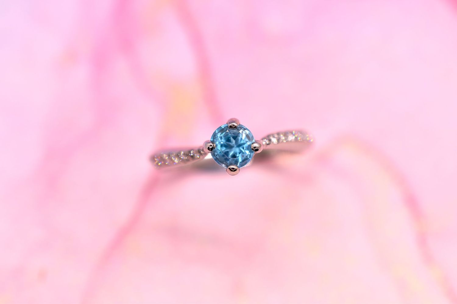 18ct White Gold Blue Zircon & Diamond Twist Ring