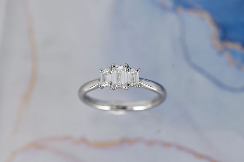 Platinum GIA Certificated Emerald Cut Diamond Trilogy Ring