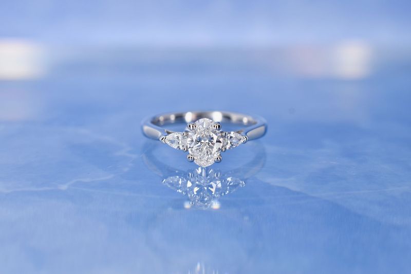 Platinum GIA Certificated Oval Cut Diamond Trilogy Ring