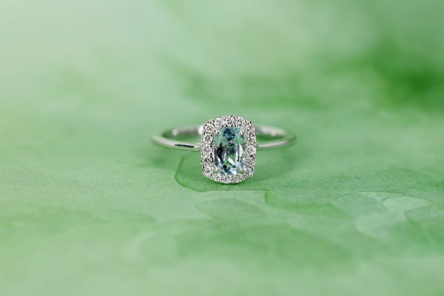 9ct White Gold Emerald cut Aquamarine and Daimond Halo ring