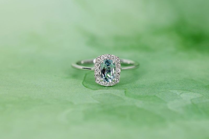 9ct White Gold Emerald cut Aquamarine and Daimond Halo ring