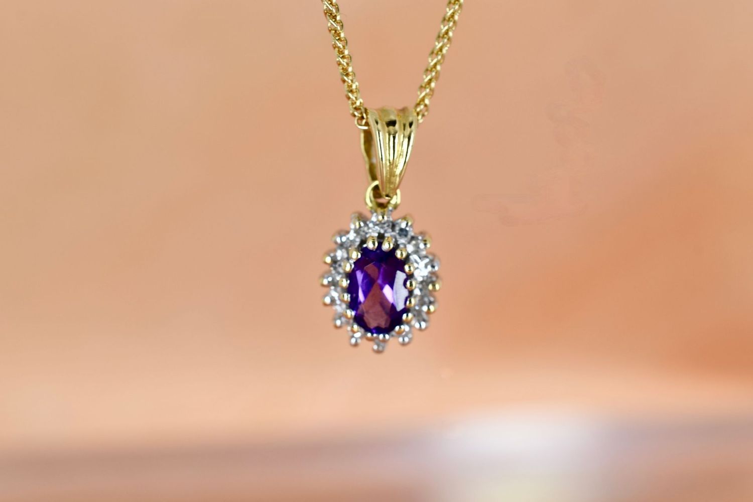 18ct Yellow Gold Oval cut Amethyst and Diamond Halo Cluster pendant
