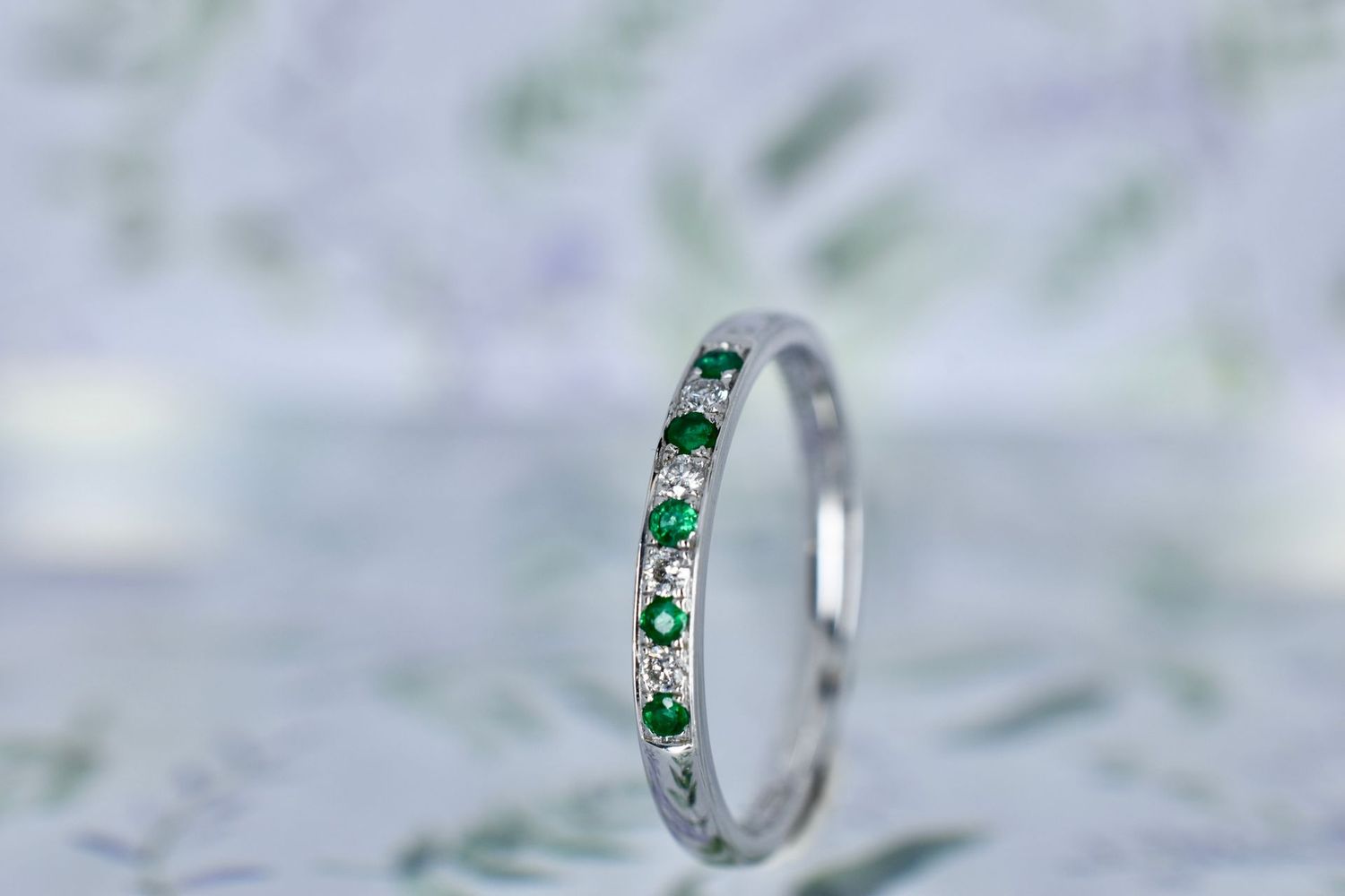 18ct White gold Emerald and Diamond 9 Stone Eternity ring