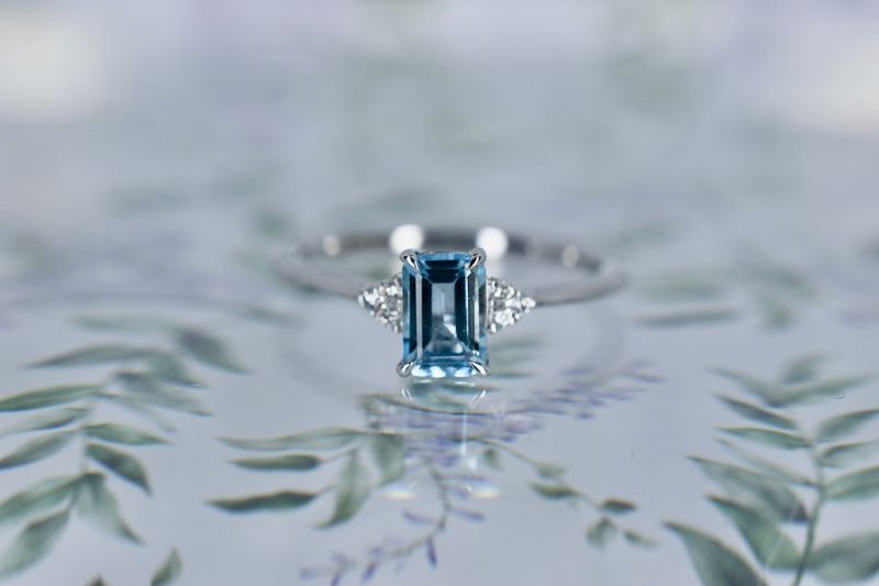 9ct White Gold Emerald cut Aquamarine and Diamond Trefoil shoulder Ring
