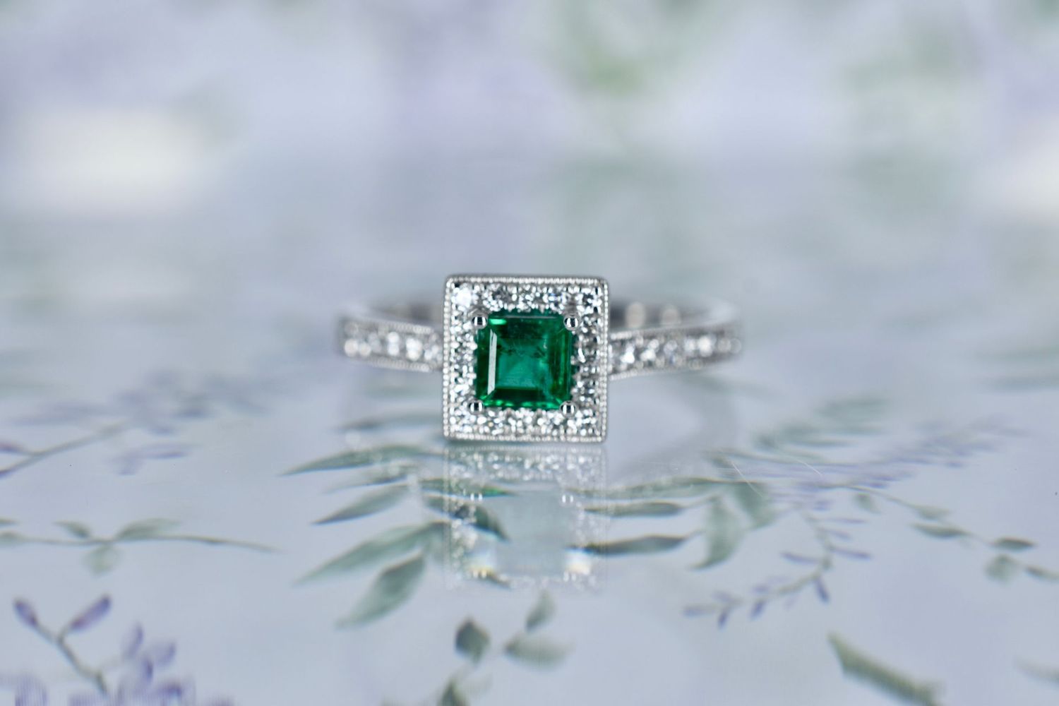 Platinum Princess cut Emerald and Diamond halo cluster ring with Diamond Shoulders
