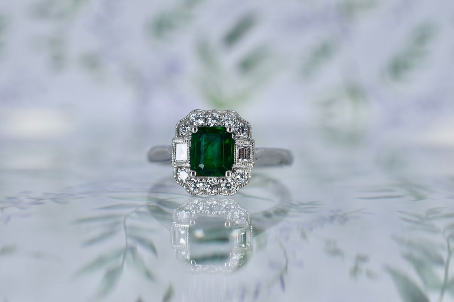 Platinum Emerald cut Emerald and Diamond Vintage Inspired Halo Cluster Ring