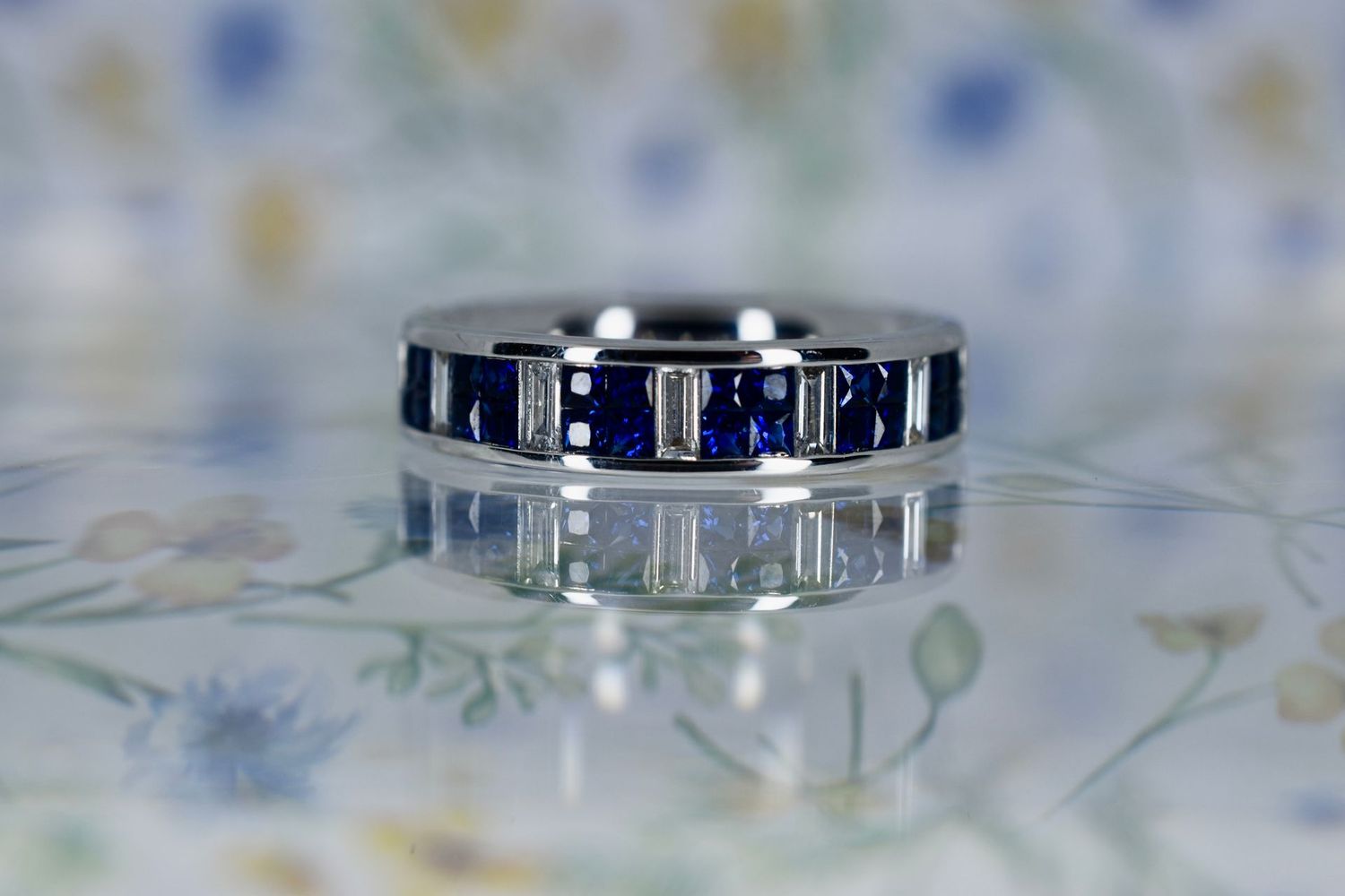 18ct White Gold Princess cut Sapphire and Baguette cut Diamond Eternity Ring