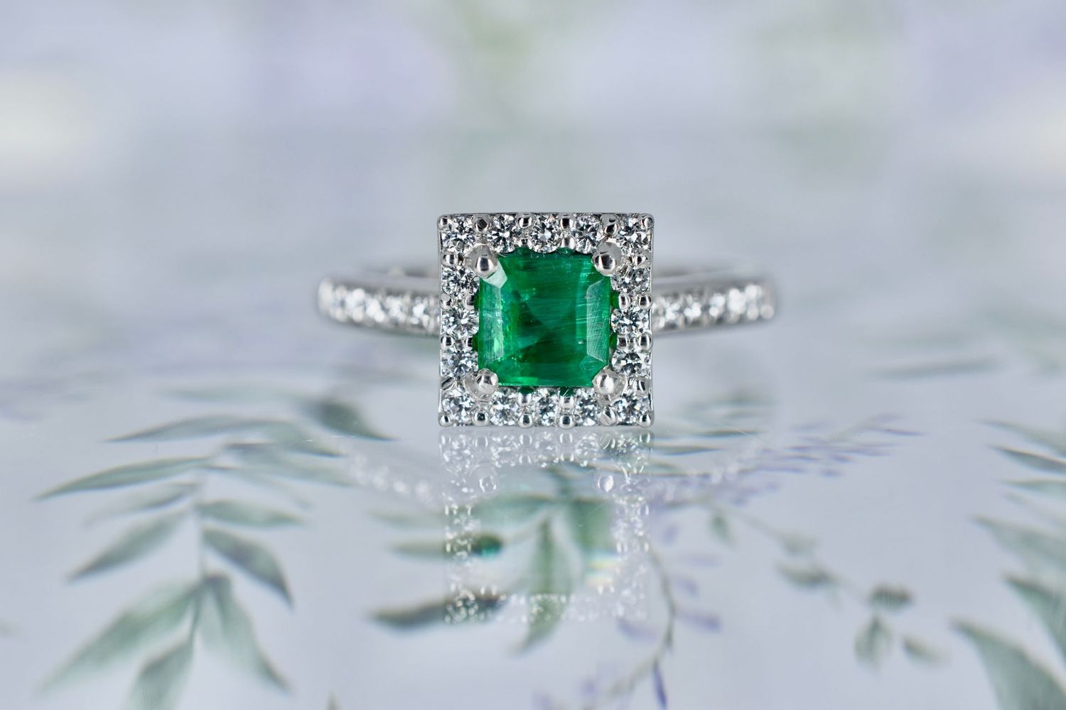 Platinum Princess cut Emerald and Diamond Halo cluster ring with Diamond Shoulders