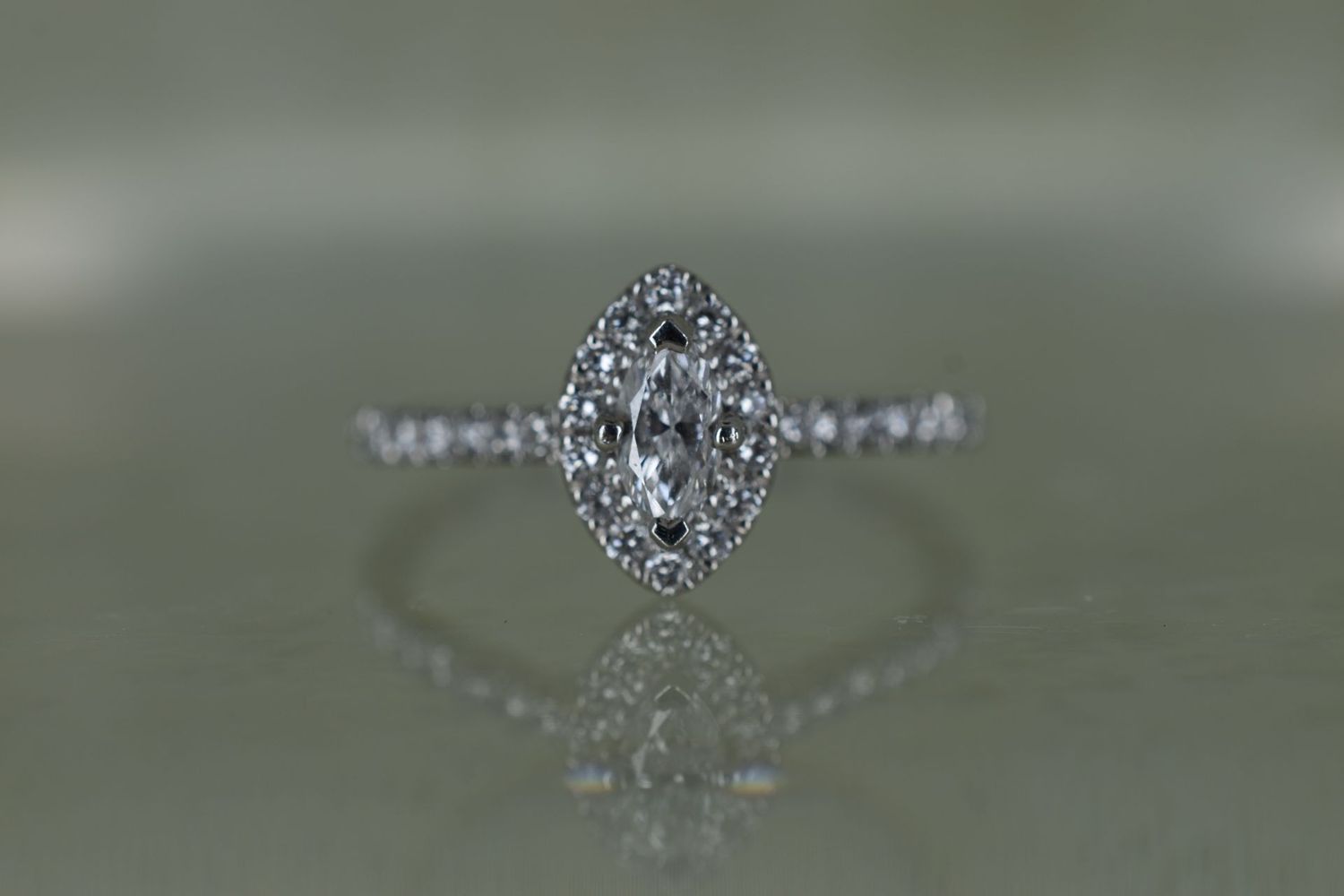 Platinum 0.24ct F SI1 Marquise Cut Diamond Halo Cluster Ring