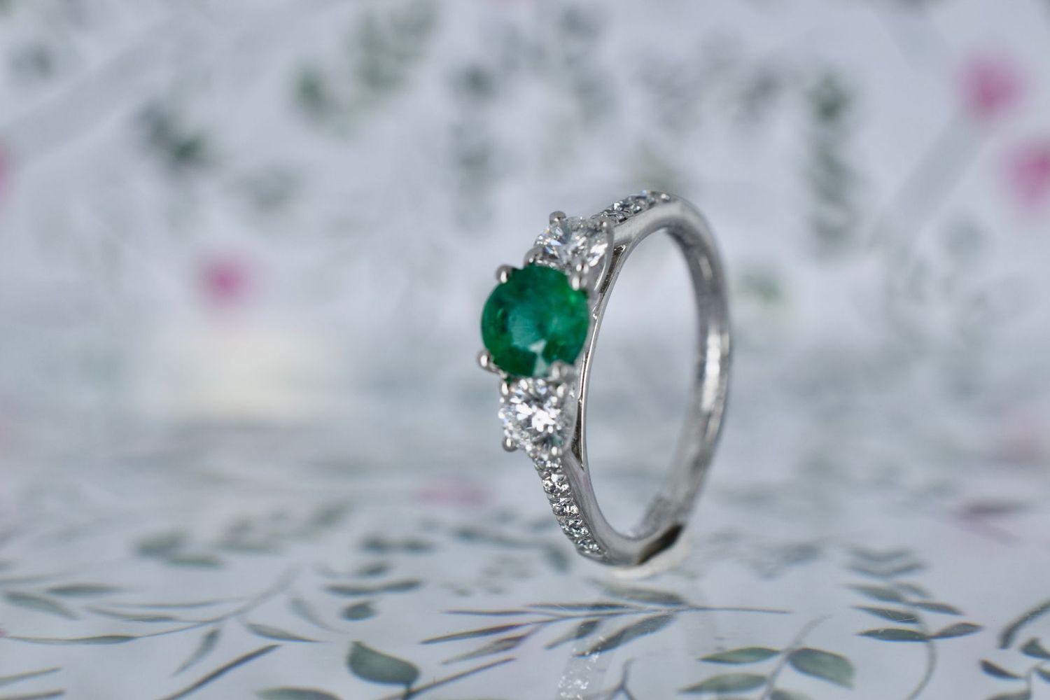 Platinum Brilliant Cut Emerald & Diamond Trilogy ring with Diamond Shoulders