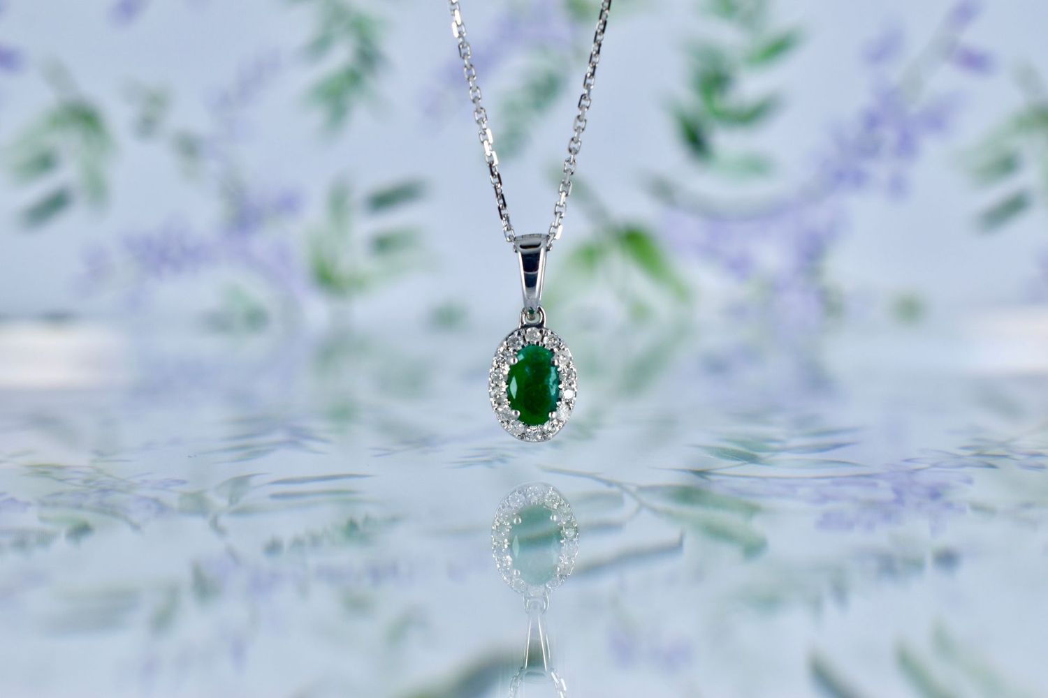 9ct White Gold Oval Cut Emerald & Diamond Halo Cluster Pendant on Adjustable Chain