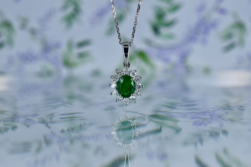 9ct White Gold Oval Cut Emerald & Diamond Halo Cluster Pendant on Adjustable Chain