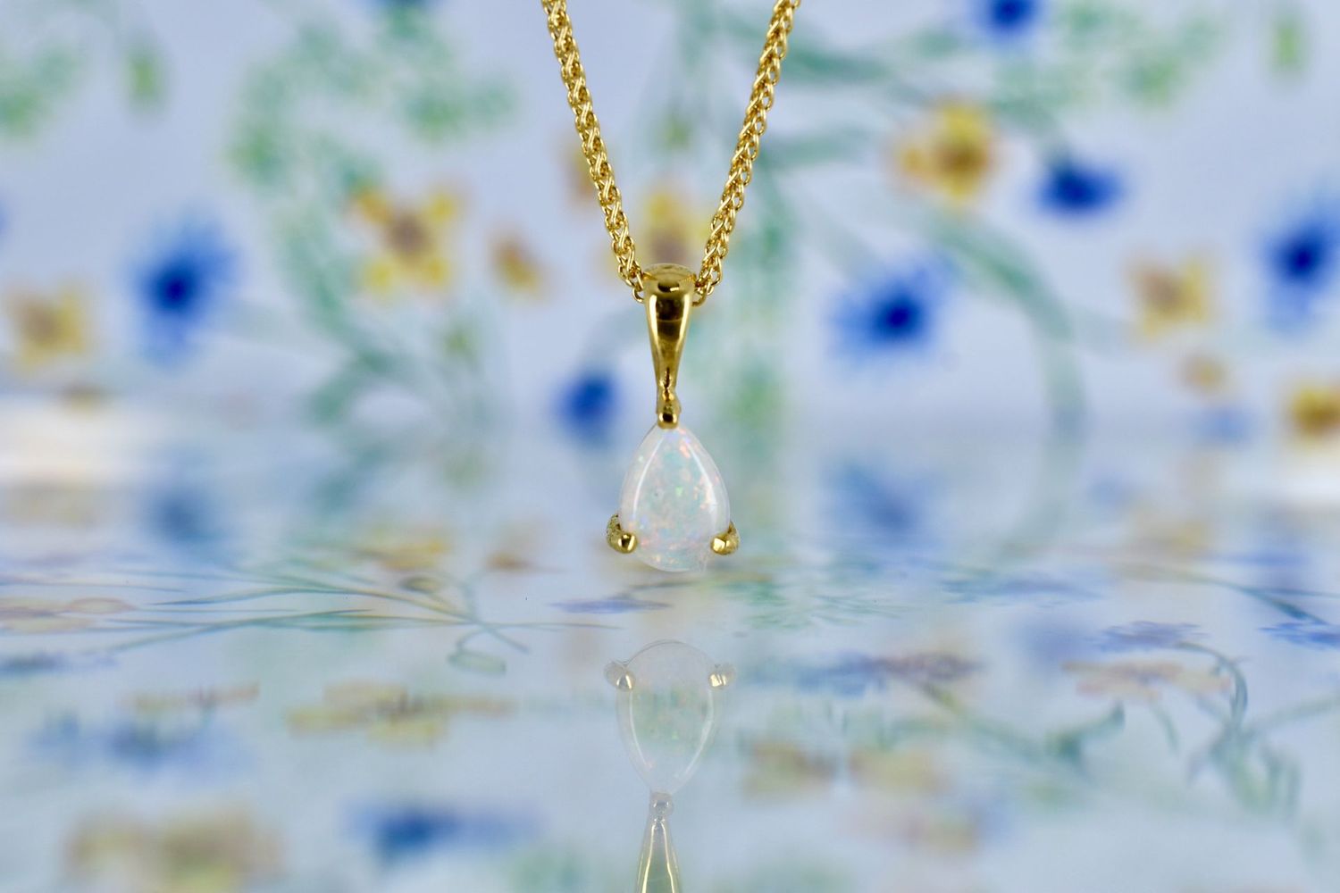 18ct Yellow Gold Claw set Pear cut Opal on 18" Chain