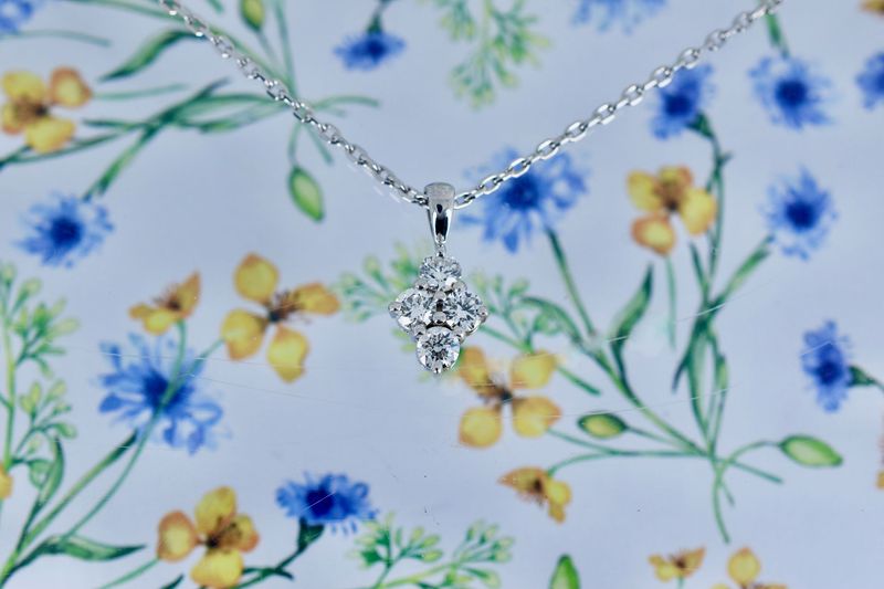 18ct White Gold Diamond Fleur de Lis Pendant on adjustable chain