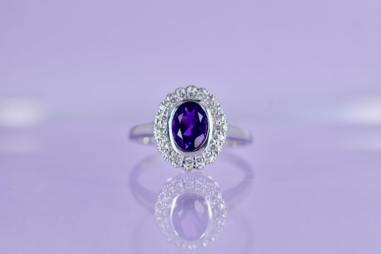 9ct White Gold Oval cut Amethyst & Diamond Halo ring