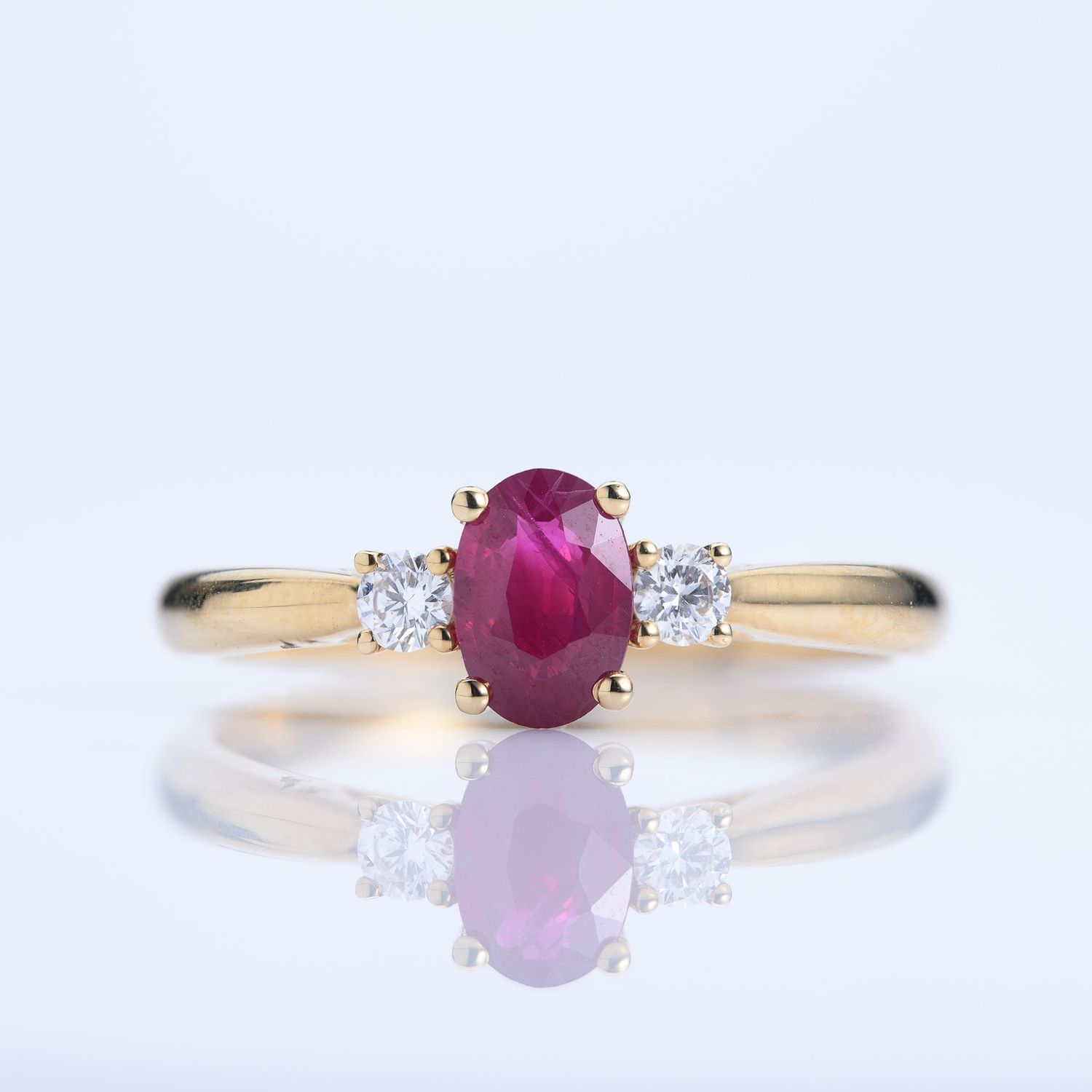 18ct Yellow Gold Oval Cut Ruby & Round Brilliant Cut Diamond Trilogy Ring