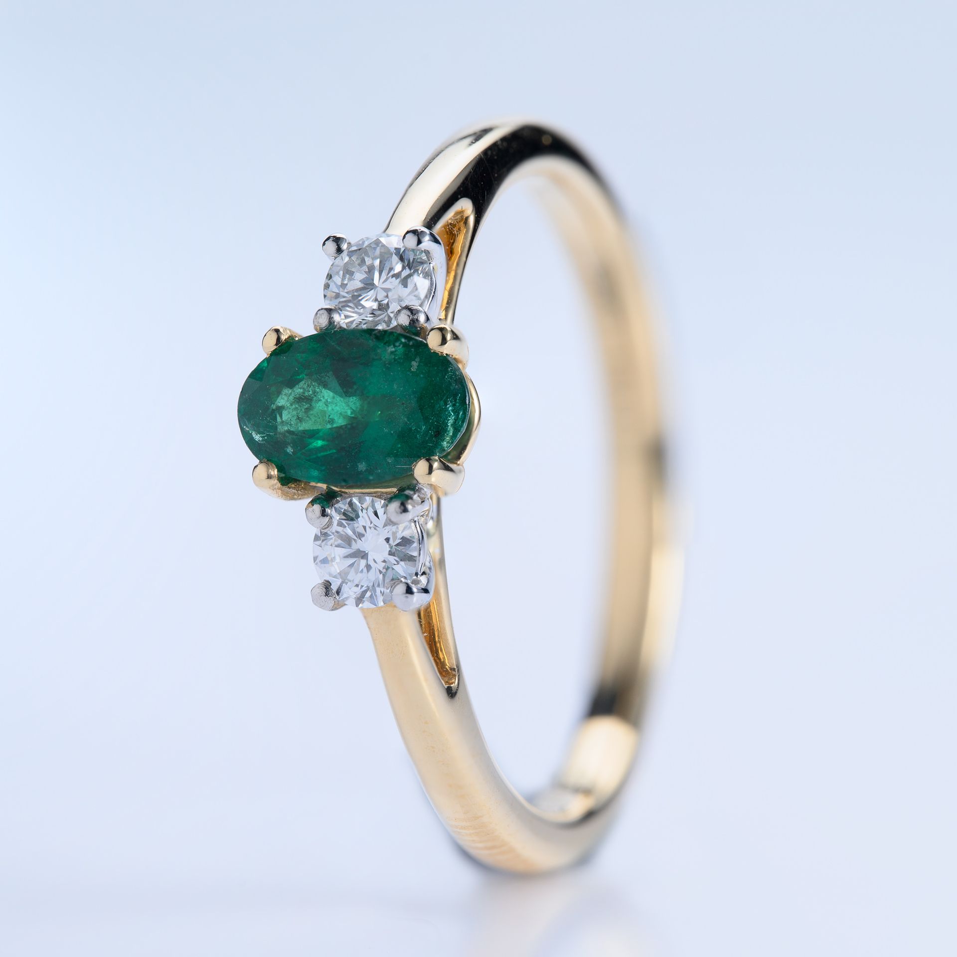 18ct Yellow Gold & Platinum Oval Cut Emerald & Round Brilliant Cut Diamond Trilogy Ring