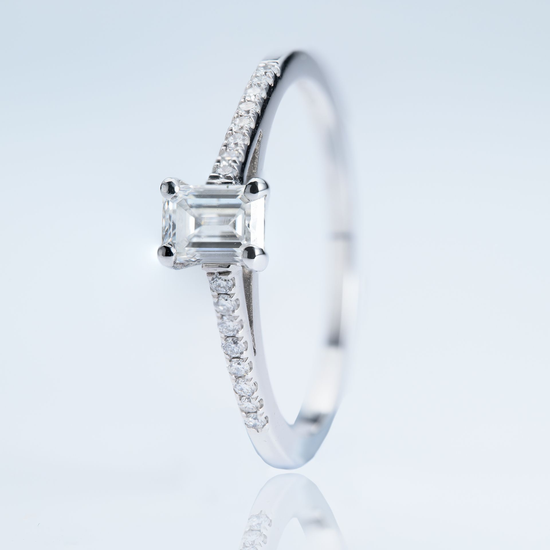 Platinum GIA Certified Emerald Cut Diamond Solitaire Ring with Diamond Set Shoulders