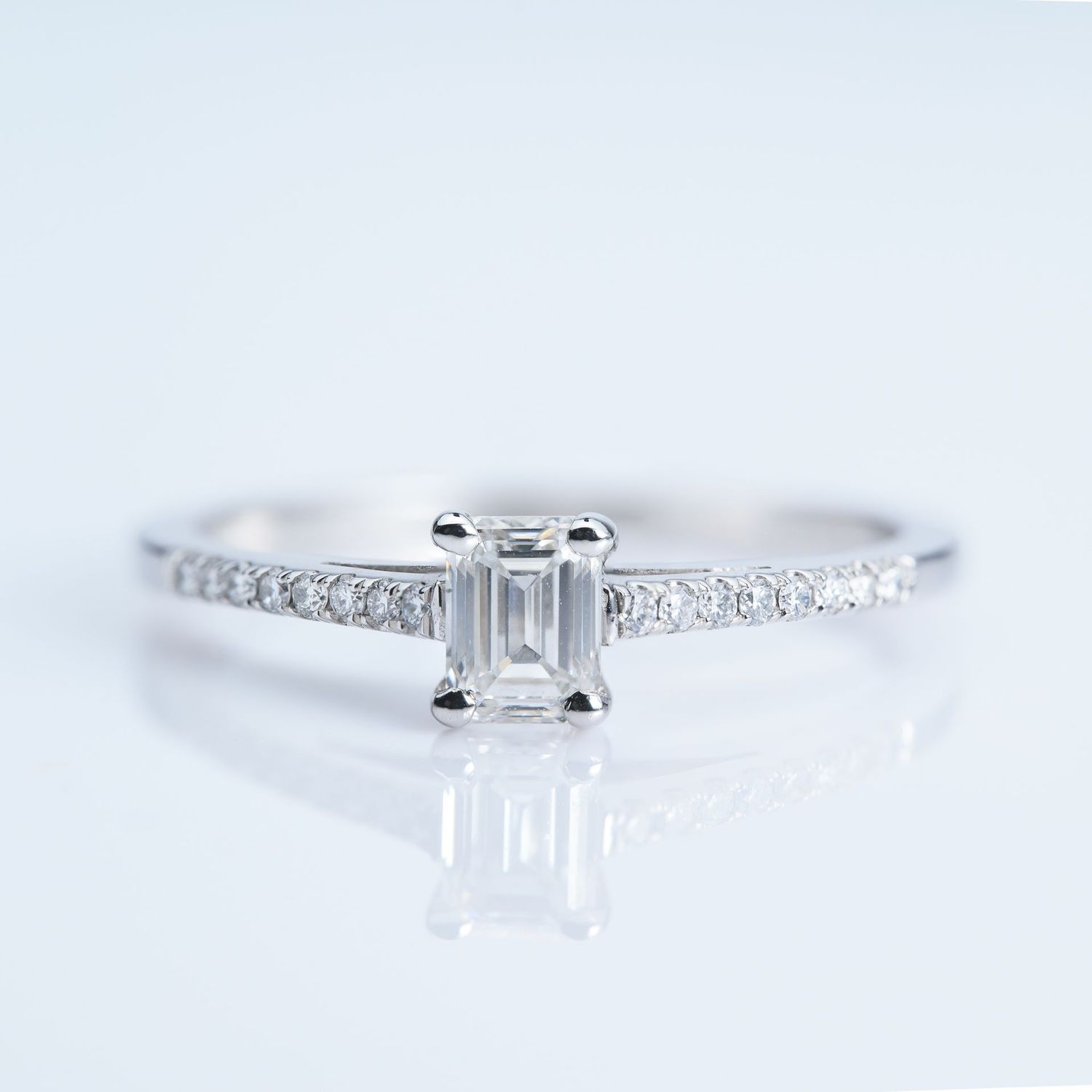 Platinum GIA Certified Emerald Cut Diamond Solitaire Ring with Diamond Set Shoulders
