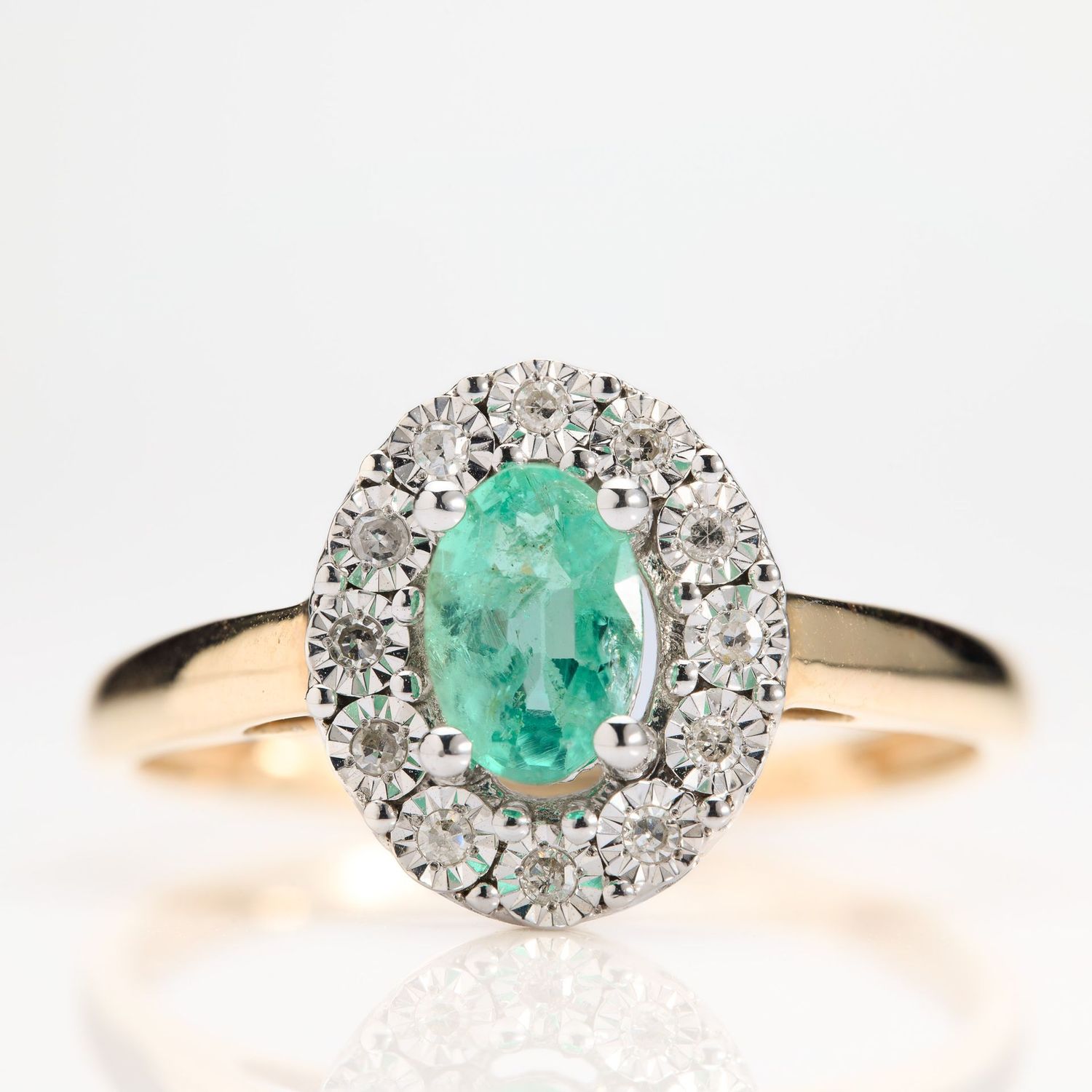 9ct Gold Oval Cut Emerald & Round Brilliant Cut Diamond Cluster Ring
