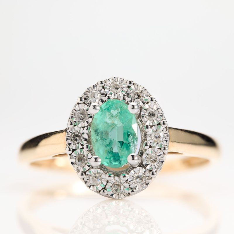 9ct Gold Oval Cut Emerald & Round Brilliant Cut Diamond Cluster Ring