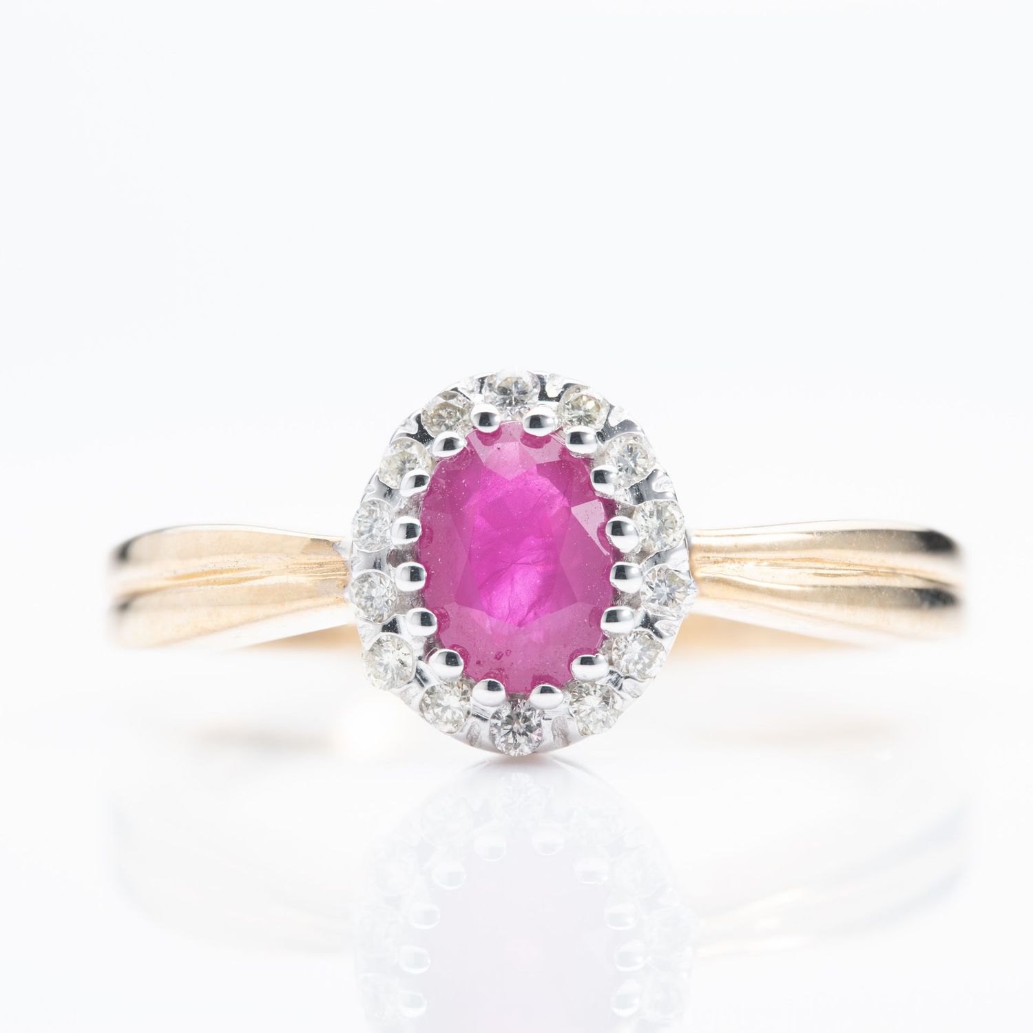 9ct Gold Oval Cut Ruby & Round Brilliant Cut Diamond Halo Cluster Ring