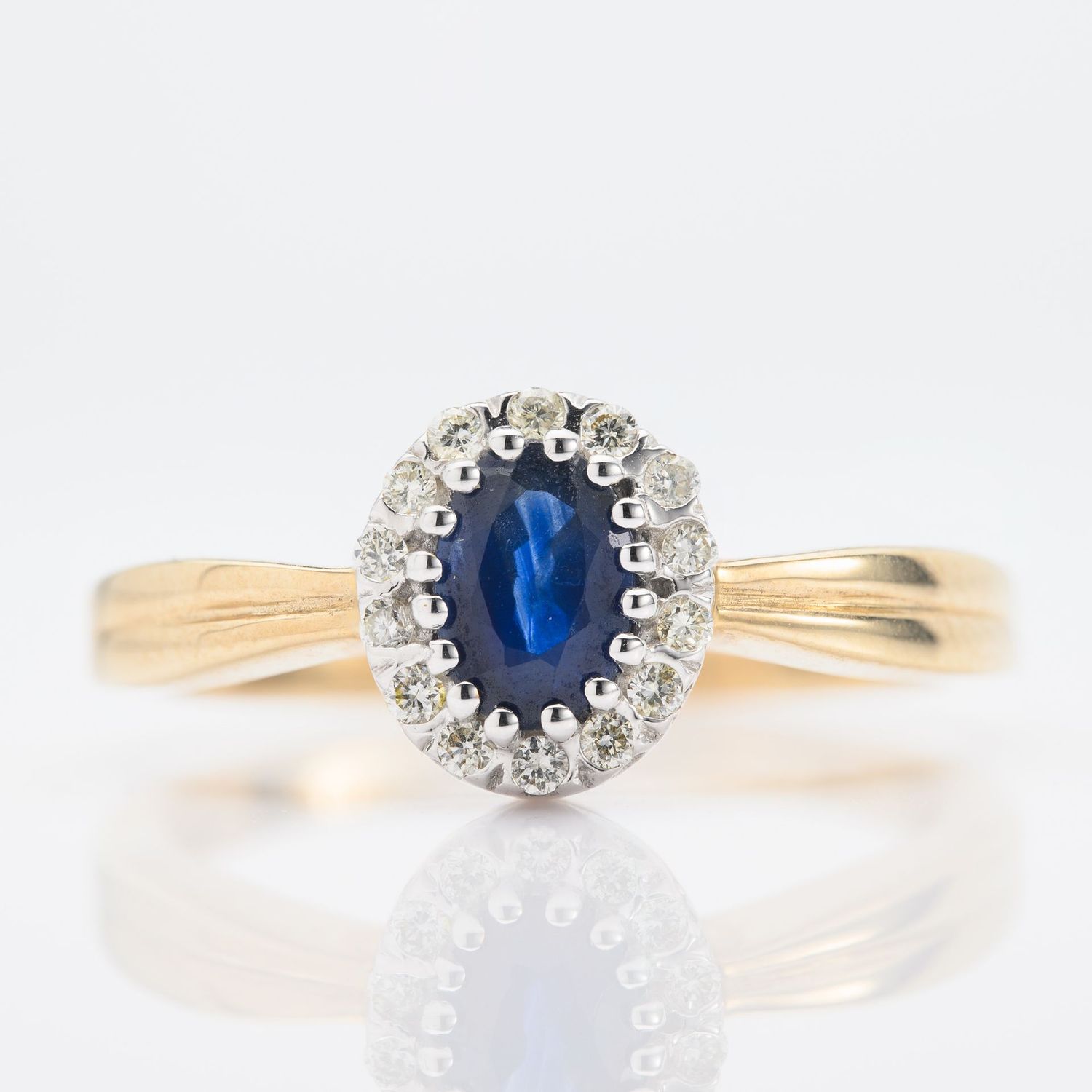 9ct Gold Oval Cut Sapphire & Round Brilliant Cut  Diamond Halo Cluster Ring