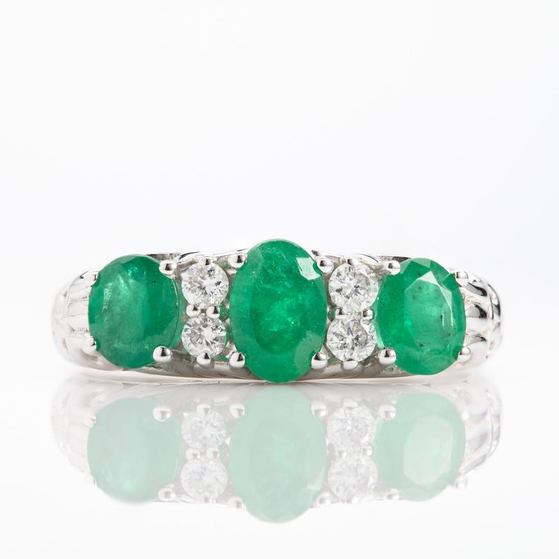 Platinum Oval Cut Emerald & Round Brilliant Cut Diamond 7-Stone Ring