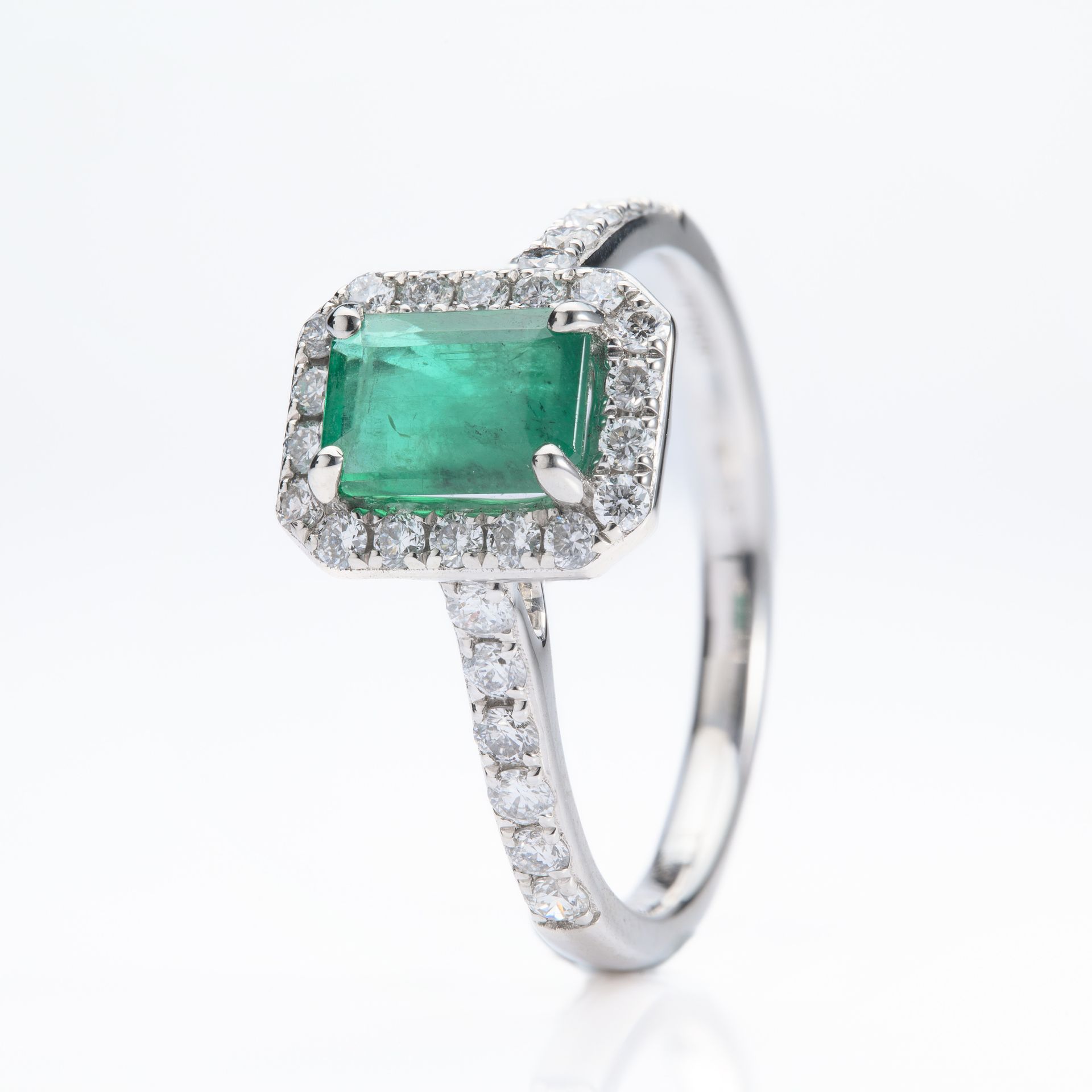 Platinum Rectangular Cut Emerald & Round Brilliant Cut Diamond Halo Cluster Ring with Diamond Shoulders