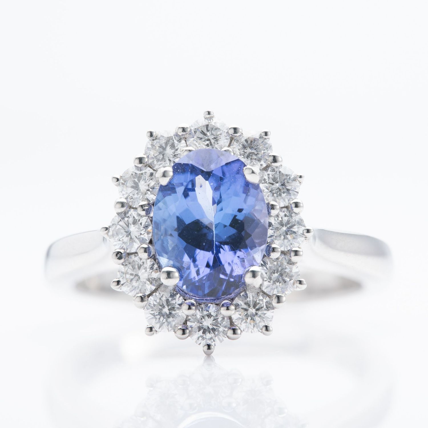 Platinum Oval Cut Tanzanite & Round Brilliant Cut Diamond Cluster Ring