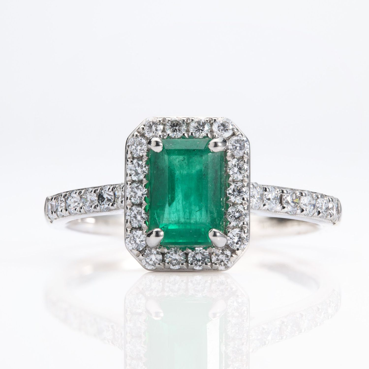Platinum Rectangular Cut Emerald & Round Brilliant Cut Diamond Halo Cluster Ring with Diamond Shoulders