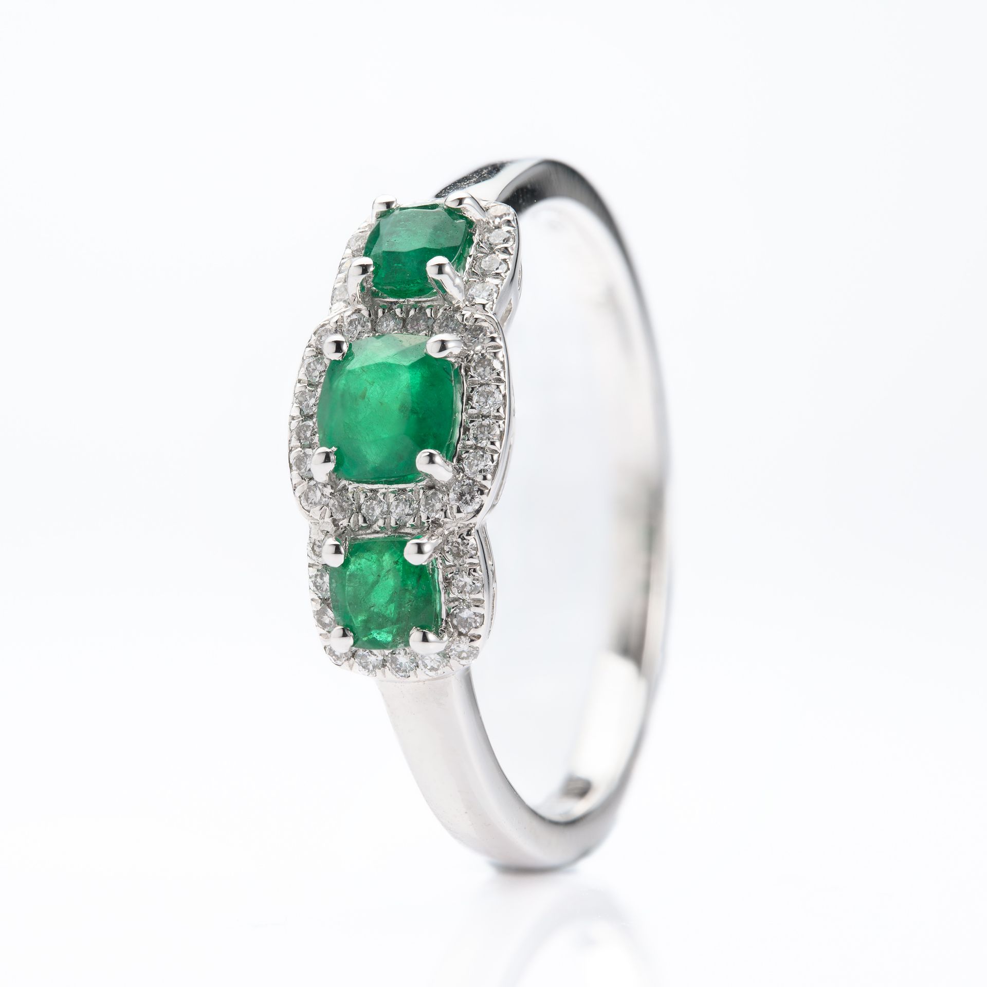 Platinum Round Cut Emerald & Round Brilliant Cut Diamond Triple Halo Cluster Ring