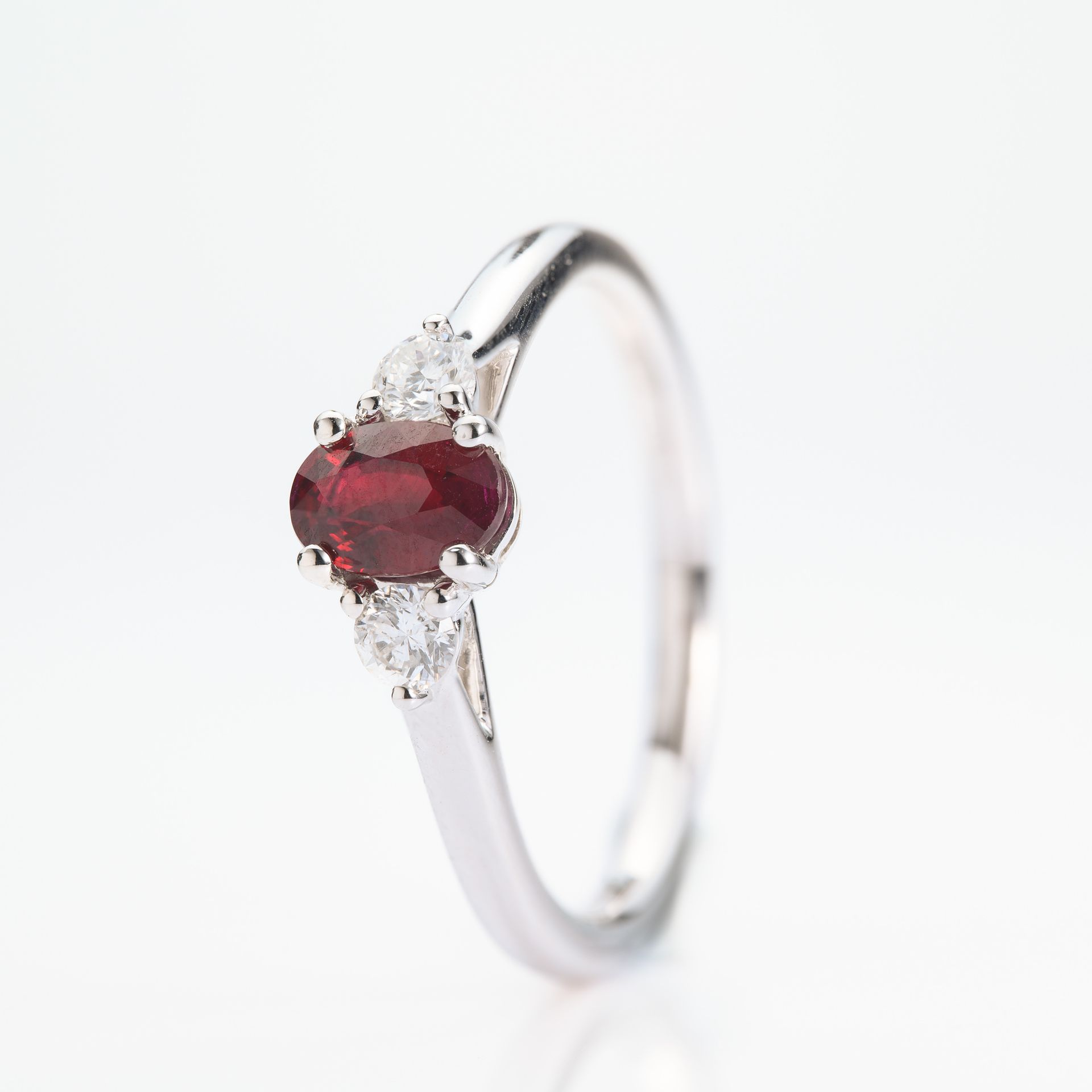 Platinum Oval Cut Ruby & Round Brilliant Cut Diamond Trilogy Ring