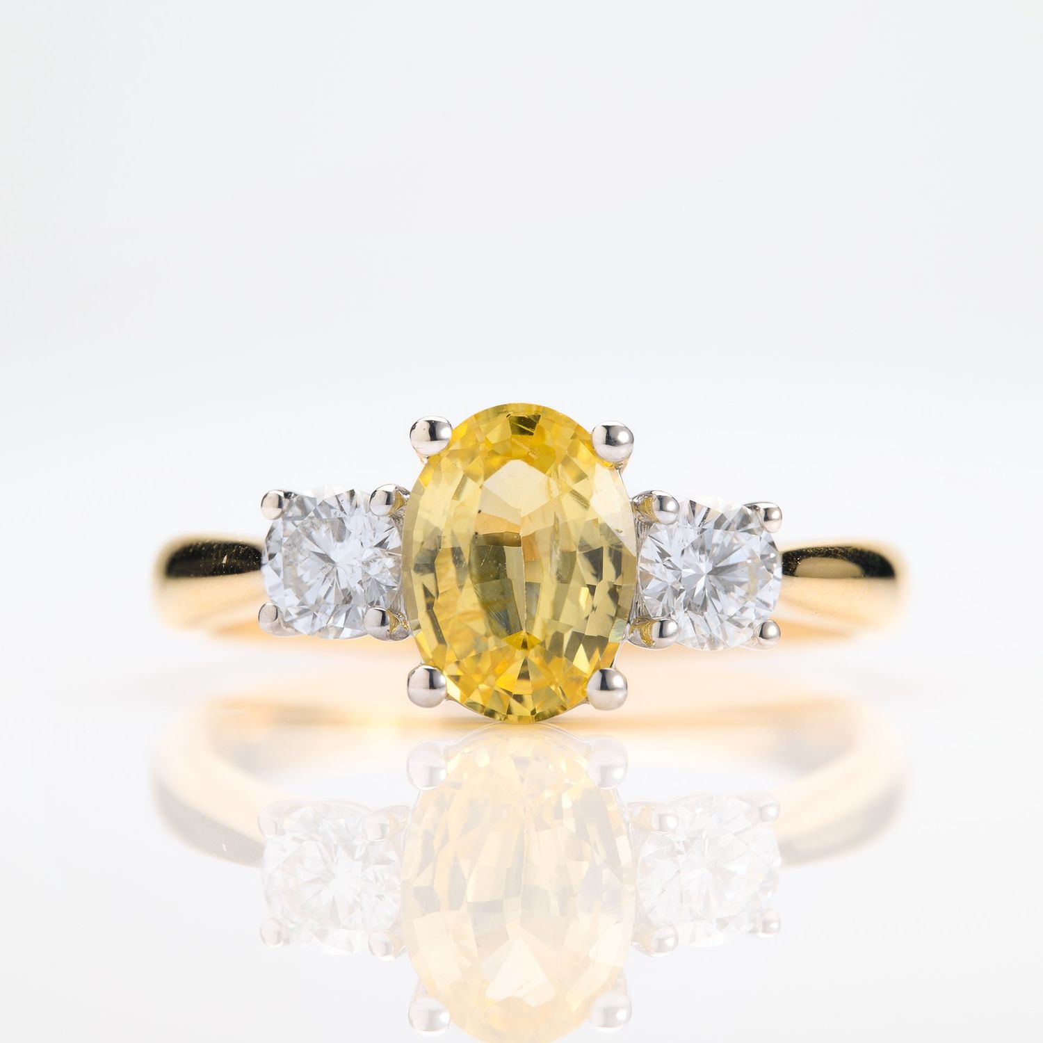 18ct Yellow Gold & Platinum Oval Cut Yellow Sapphire & Round Brilliant Cut Diamond Trilogy Ring