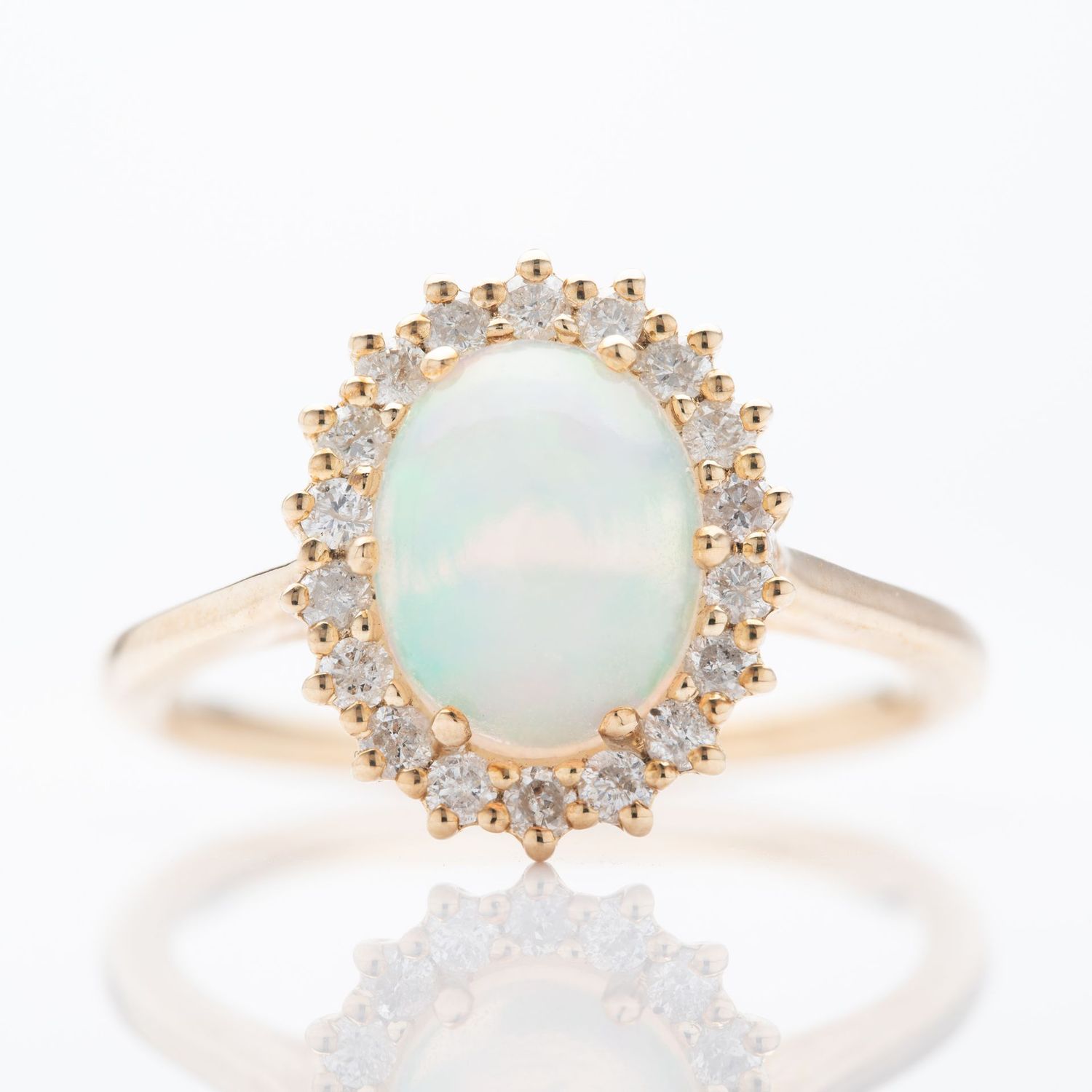 9ct Yellow Gold Oval Cut Opal and Round Brilliant Cut Diamond Cluster Ring