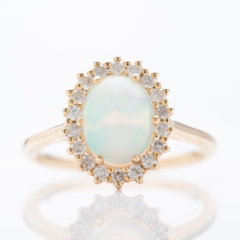 9ct Yellow Gold Oval Cut Opal and Round Brilliant Cut Diamond Cluster Ring