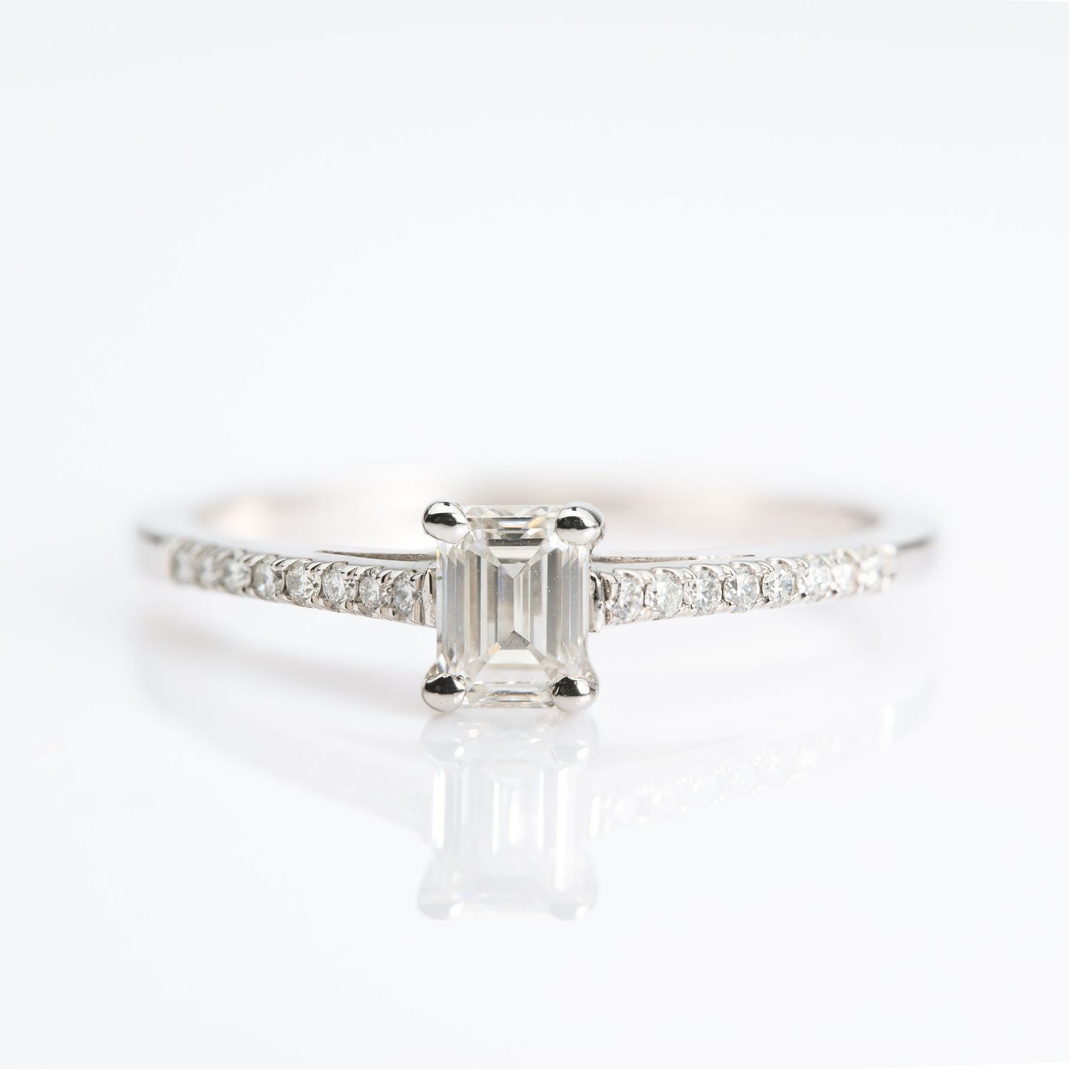 Platinum GIA Certified Emerald Cut Diamond Solitaire Ring with Diamond Set Shoulders