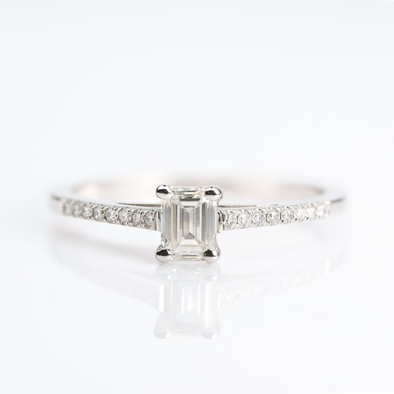 Platinum GIA Certified Emerald Cut Diamond Solitaire Ring with Diamond Set Shoulders