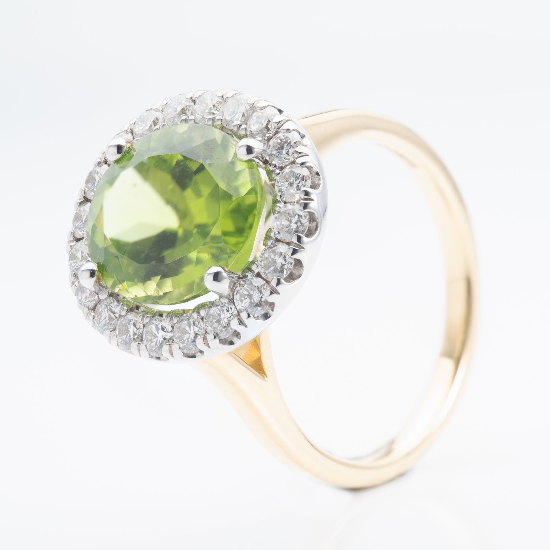 18ct Gold Oval Cut Peridot & Round Brilliant Cut Diamond Halo Cluster Ring