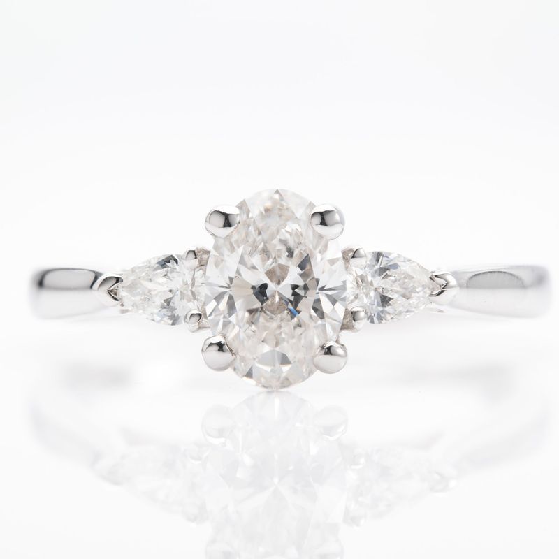 Platinum GIA Certificated Oval Cut & Pear Cut Diamond Trilogy Ring