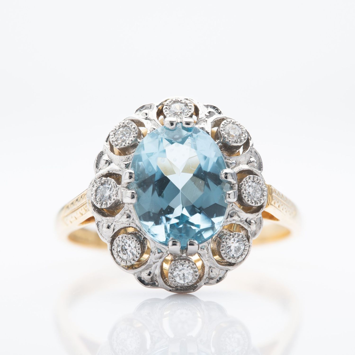 18ct Yellow Gold & Platinum Oval Cut Aquamarine & Round Brilliant Cut Diamond Cluster Ring
