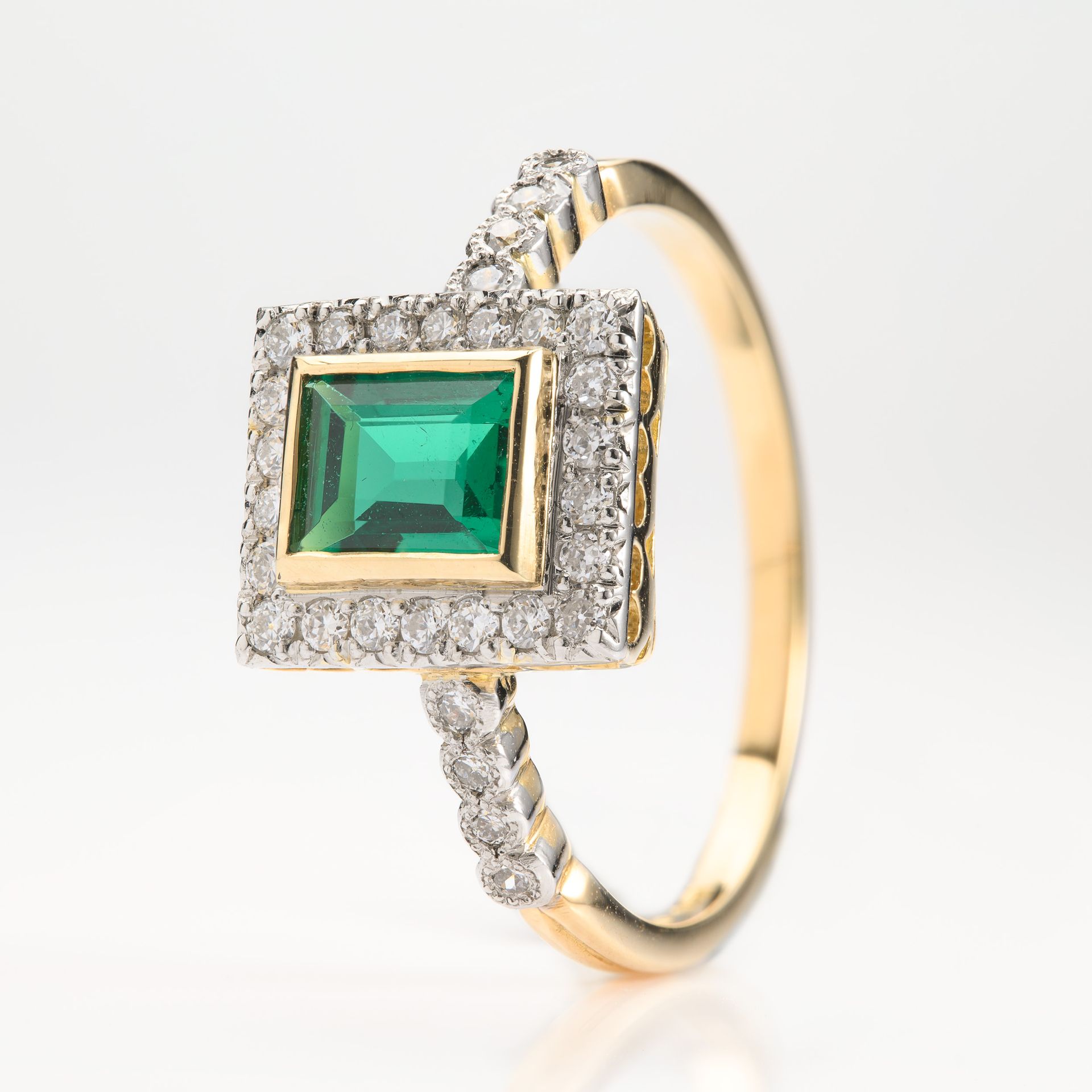 18ct Yellow Gold & Platinum Rectangular Cut Emerald & Round Brilliant Cut Diamond Halo Cluster Ring