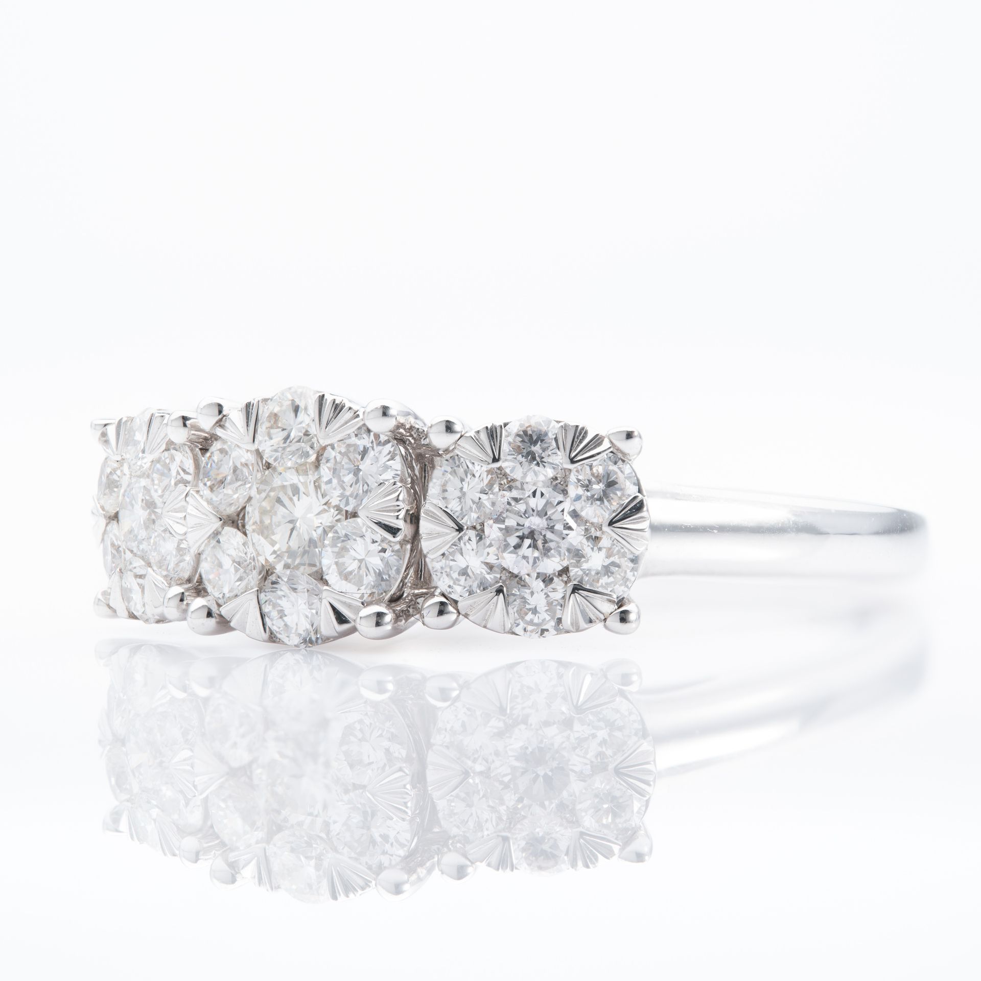 18ct illusion set trilogy ring