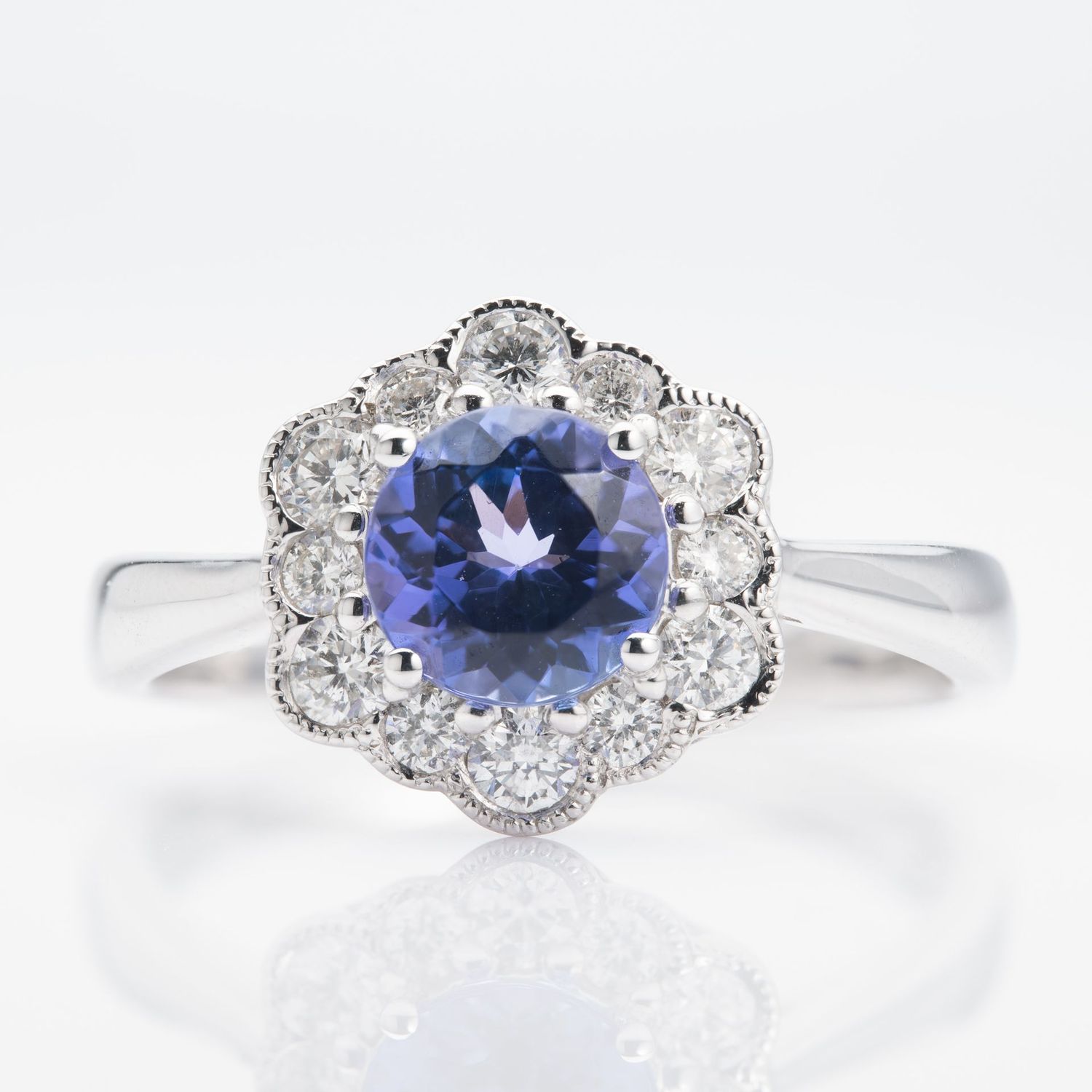 Platinum Round Cut Tanzanite & Round Brilliant Cut Diamond Cluster Ring