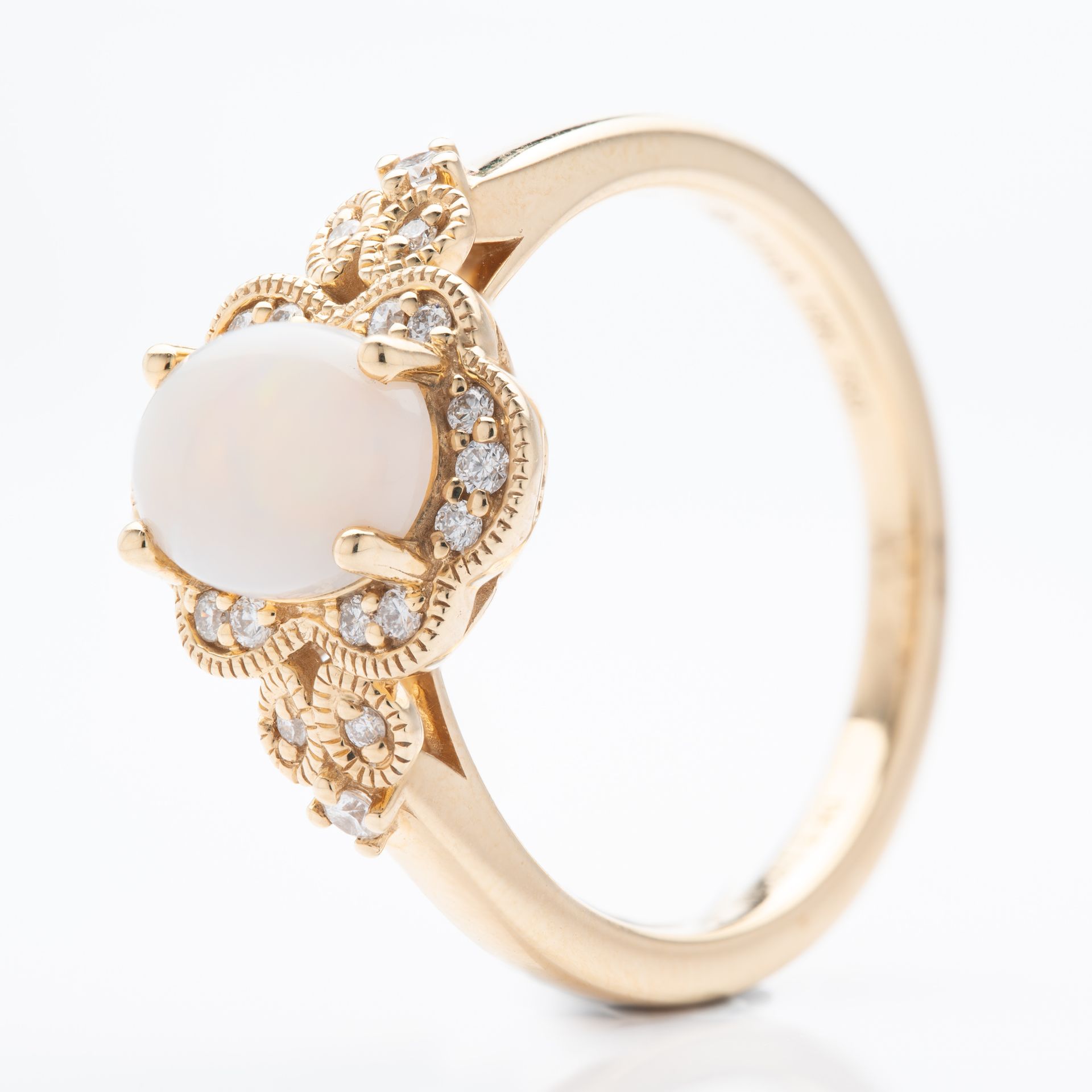 18ct Yellow Gold Oval Cut Opal and Brilliant Cut Diamond Ring