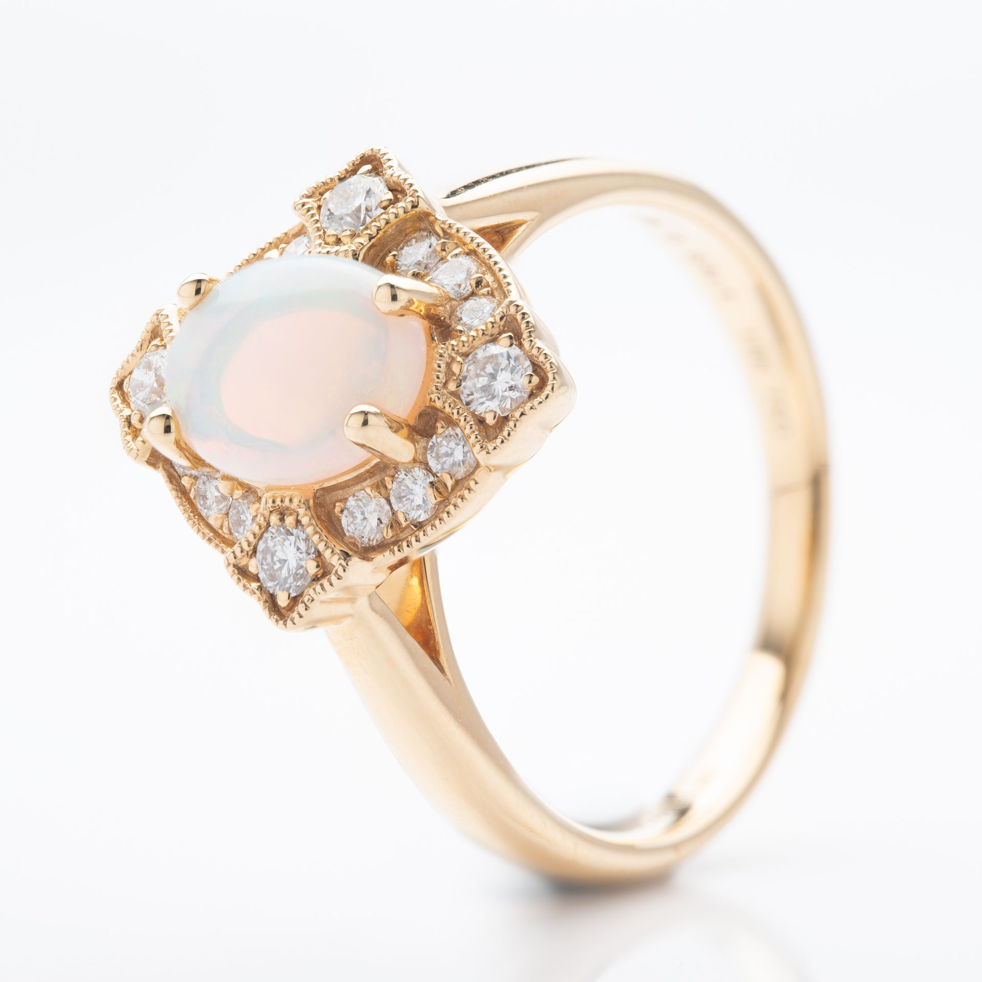 18ct Yellow Gold Oval Cut Opal and Brilliant Cut Diamond Vintage Ring with Milgrain finish