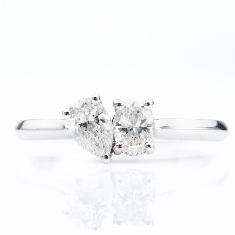 Platinum Pear and Oval Cut Diamond toi et moi Ring