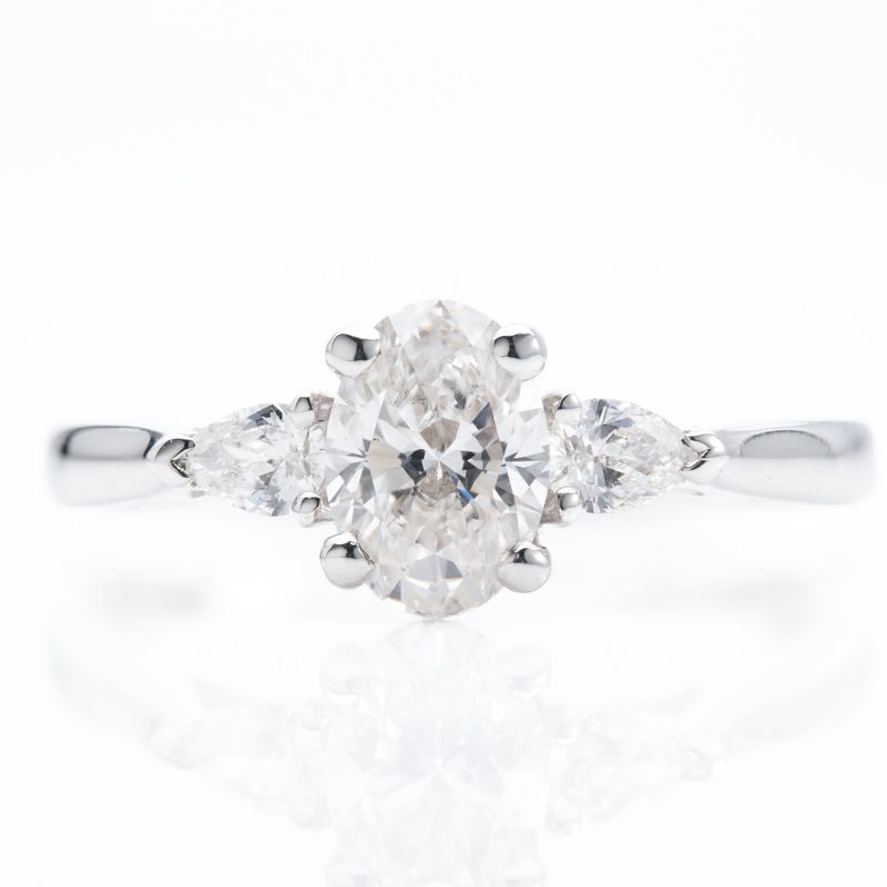 Platinum GIA Certificated Oval Cut & Pear Cut Diamond Trilogy Ring